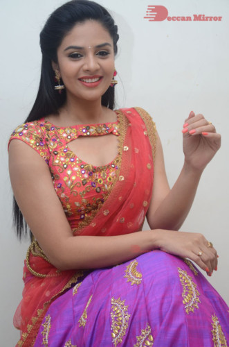 Telugu Actress Sreemukhi in a half saree dress