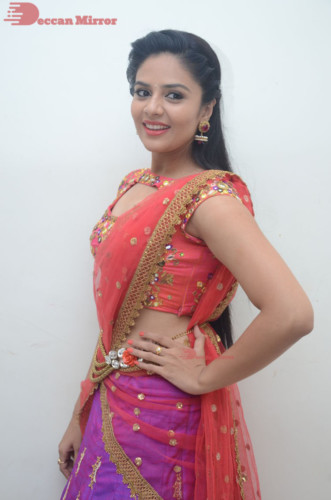 Telugu Actress Sreemukhi in a half saree dress