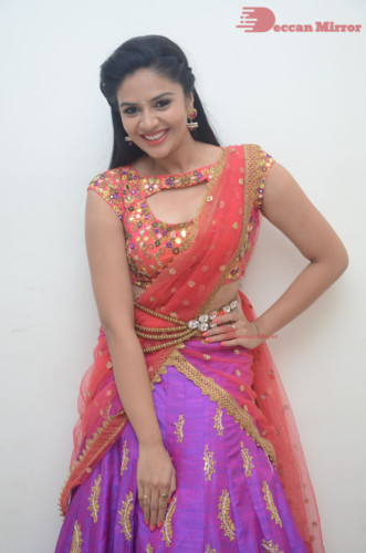 Telugu Actress Sreemukhi in a half saree dress
