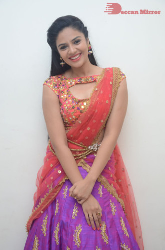 Telugu Actress Sreemukhi in a half saree dress