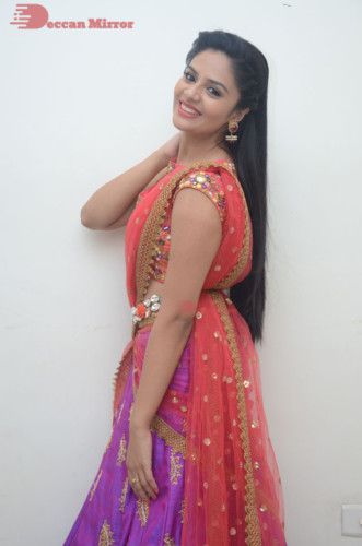 Telugu Actress Sreemukhi in a half saree dress