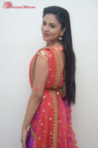 Telugu Actress Sreemukhi in a half saree dress
