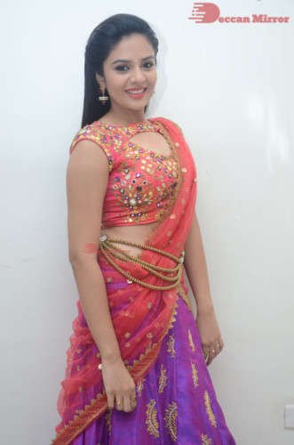 Telugu Actress Sreemukhi in a half saree dress
