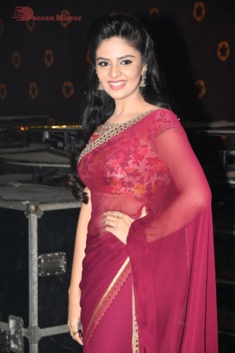 Telugu Actress Sreemukhi in a red saree
