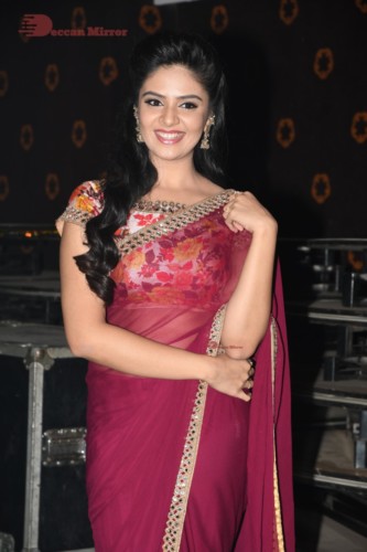 Telugu Actress Sreemukhi in a red saree
