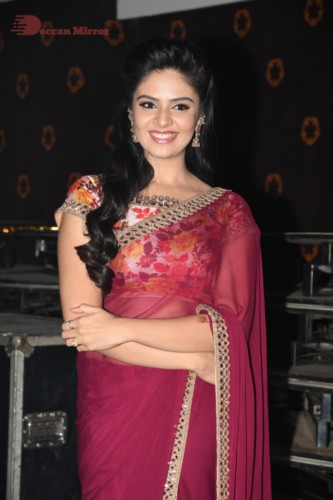 Telugu Actress Sreemukhi in a red saree