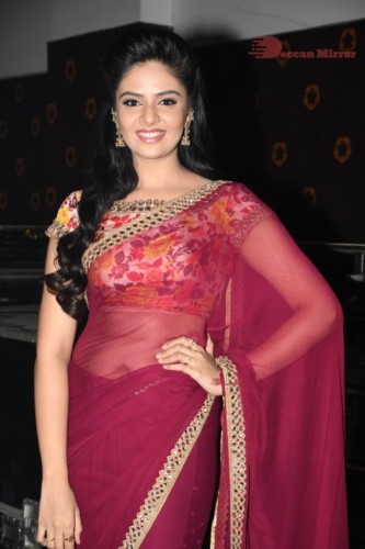 Telugu Actress Sreemukhi in a red saree