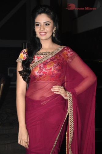 Telugu Actress Sreemukhi in a red saree