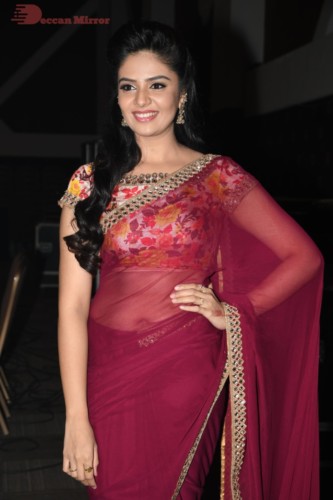 Telugu Actress Sreemukhi in a red saree