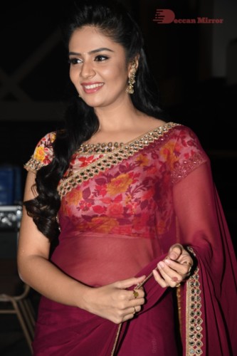 Telugu Actress Sreemukhi in a red saree