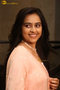 actress sri divya cute photo shoot in a pink salwar dress