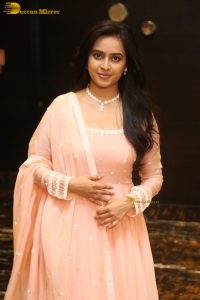 actress sri divya cute photo shoot in a pink salwar dress