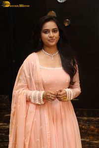 actress sri divya cute photo shoot in a pink salwar dress