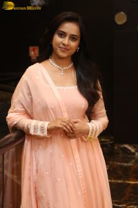actress sri divya cute photo shoot in a pink salwar dress