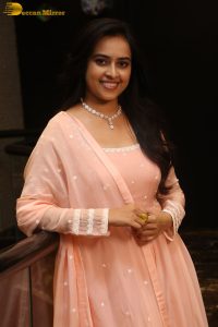 actress sri divya cute photo shoot in a pink salwar dress