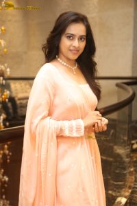 actress sri divya cute photo shoot in a pink salwar dress