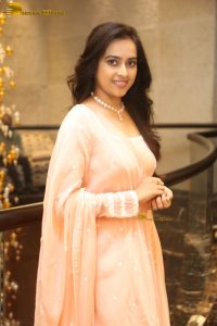 actress sri divya cute photo shoot in a pink salwar dress