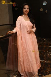actress sri divya cute photo shoot in a pink salwar dress