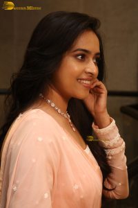 actress sri divya cute photo shoot in a pink salwar dress