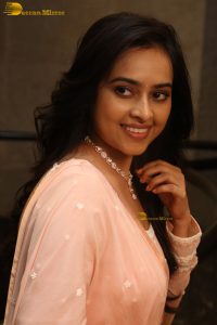 actress sri divya cute photo shoot in a pink salwar dress