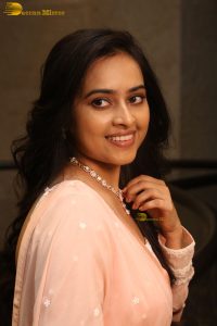 actress sri divya cute photo shoot in a pink salwar dress