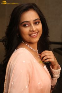 actress sri divya cute photo shoot in a pink salwar dress