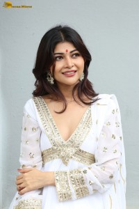 actress Srijita Ghosh cute photo shoot in a white salwar dress