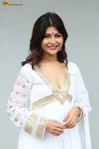 actress Srijita Ghosh cute photo shoot in a white salwar dress