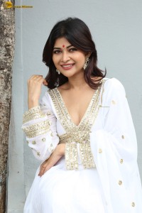 actress Srijita Ghosh cute photo shoot in a white salwar dress