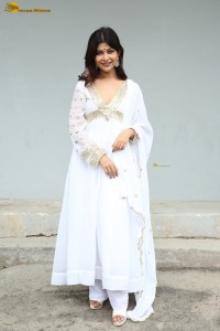 actress Srijita Ghosh cute photo shoot in a white salwar dress