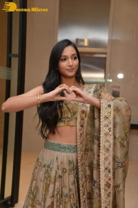 Actress Srinidhi Shetty in a gold color Lehenga Choli while attending the Pre-release function of the movie KGF Chapter 2