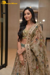 Actress Srinidhi Shetty in a gold color Lehenga Choli while attending the Pre-release function of the movie KGF Chapter 2