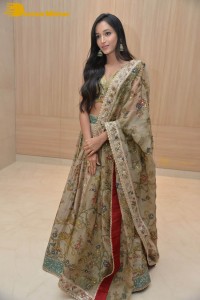Actress Srinidhi Shetty in a gold color Lehenga Choli while attending the Pre-release function of the movie KGF Chapter 2