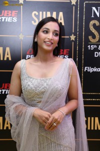 actress srinidhi shetty glam avatar in a white dress at an event