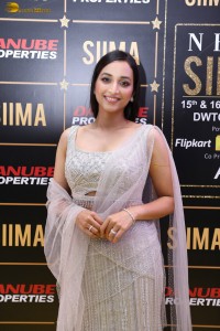 actress srinidhi shetty glam avatar in a white dress at an event