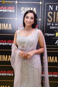 actress srinidhi shetty glam avatar in a white dress at an event