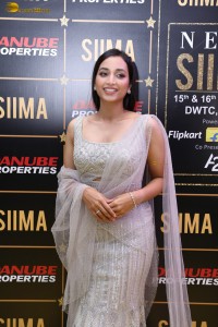 actress srinidhi shetty glam avatar in a white dress at an event