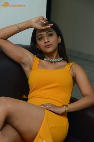 Telugu Actress Sruthi Shetty in a yellow dress