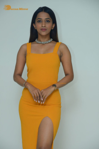 Telugu Actress Sruthi Shetty in a yellow dress