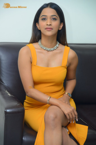 Telugu Actress Sruthi Shetty in a yellow dress