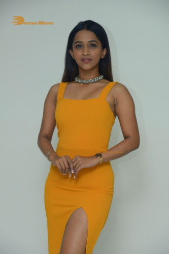 Telugu Actress Sruthi Shetty in a yellow dress