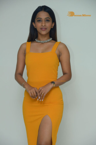 Telugu Actress Sruthi Shetty in a yellow dress
