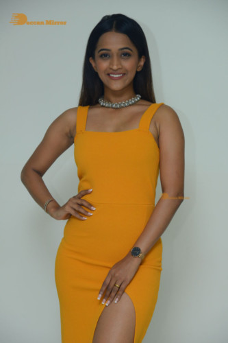 Telugu Actress Sruthi Shetty in a yellow dress