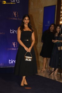 srk daughter and actress Suhana Khan in a black dress at an event