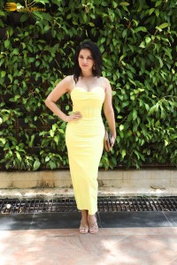Indian actress Sunny Leone in a shoulderless yellow dress