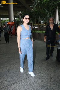 Sunny Leone dressed in denim at the Airport
