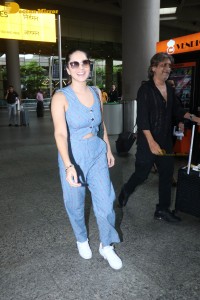 Sunny Leone dressed in denim at the Airport