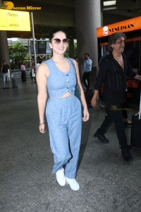 Sunny Leone dressed in denim at the Airport