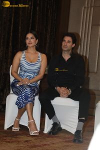 actress Sunny Leone in a blue dress at an event