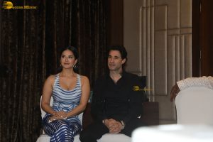 actress Sunny Leone in a blue dress at an event